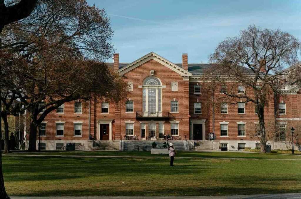 Person standing in front of a Brown University campus building