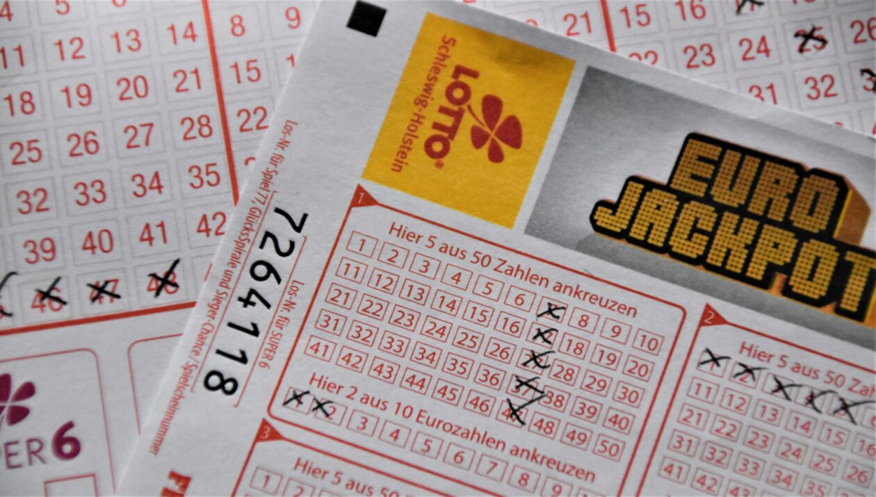 Close-up of a Powerball lottery ticket with numbers highlighted for $1.25 billion jackpot