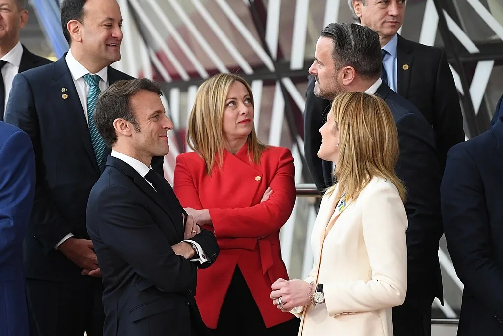 Italian Prime Minister Giorgia Meloni talking with European leaders at the Special European Council meeting in February 2023.